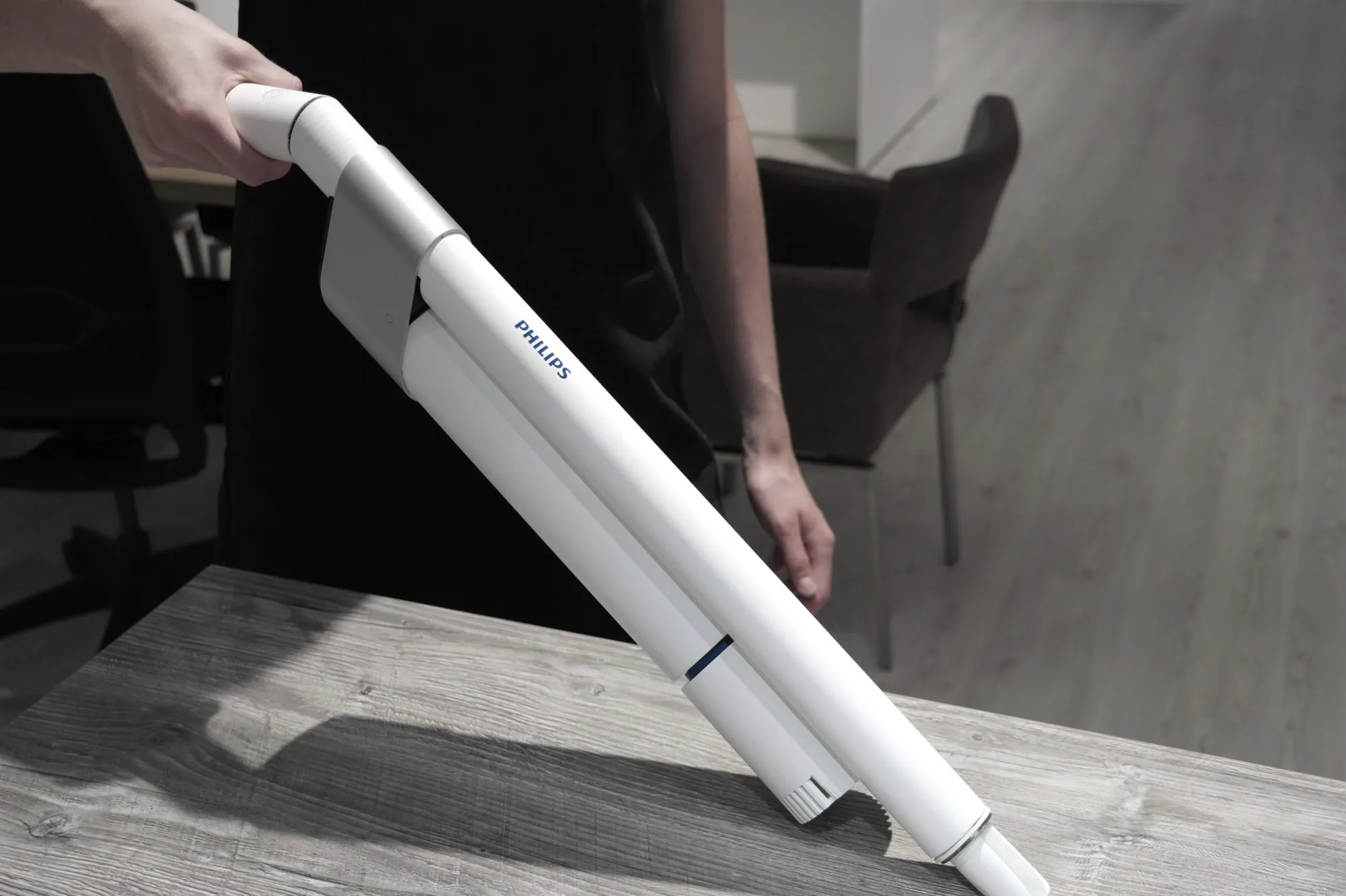 The handheld, pulled free of the stick.