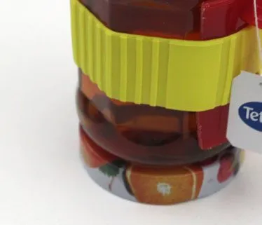 The jar standing on its own upturned lid as a coaster