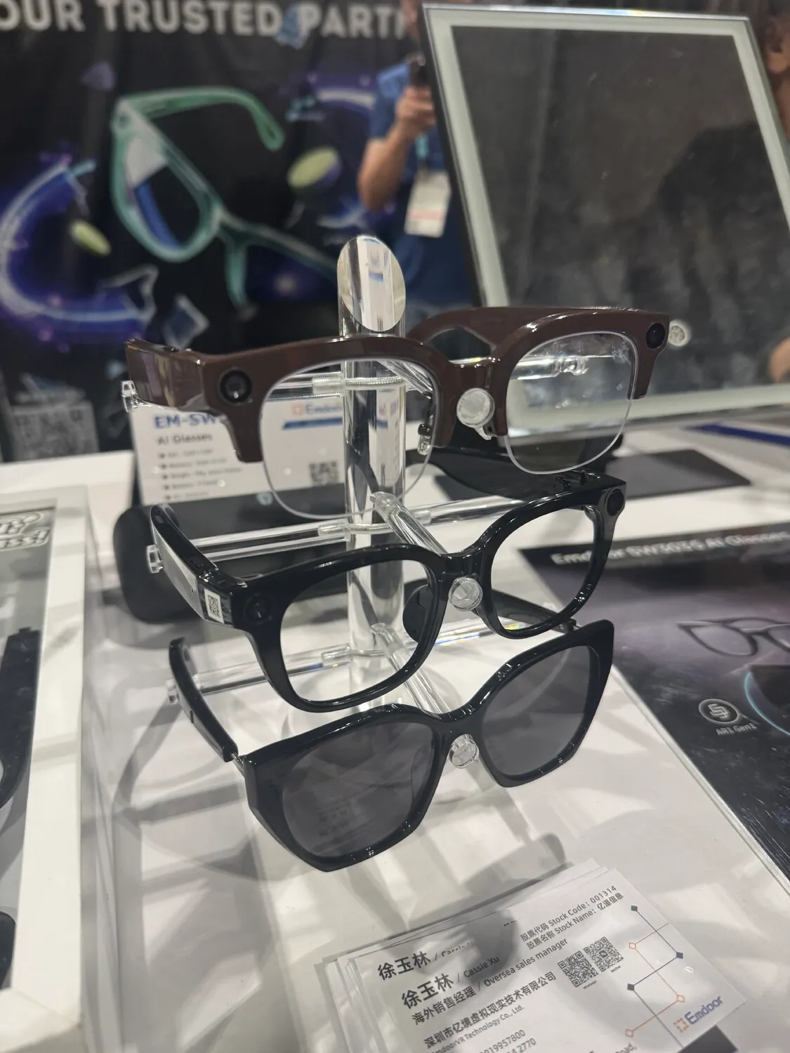 A stack of smartglasses displayed on a stand