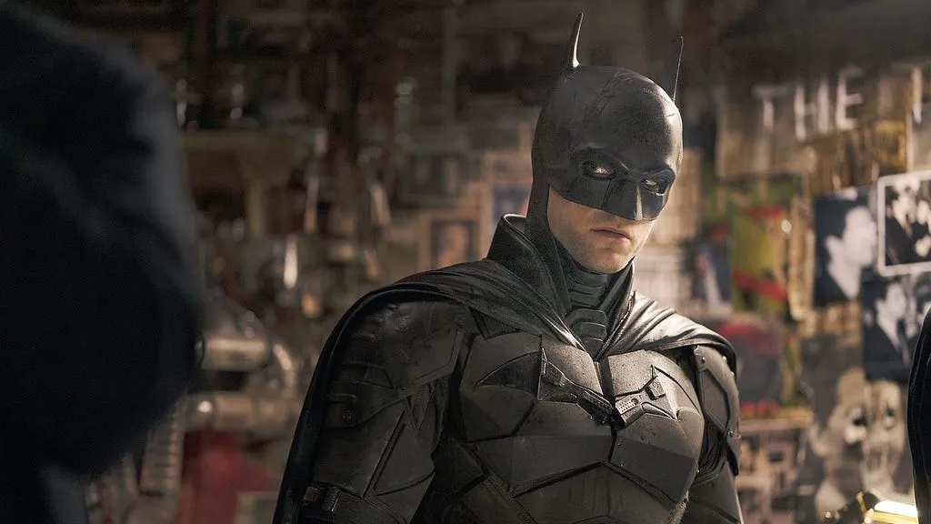 Alt Text: Batman standing amidst a crime scene