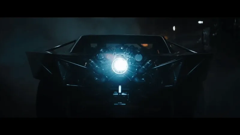 Alt: Batman’s car blowing flames from its back
